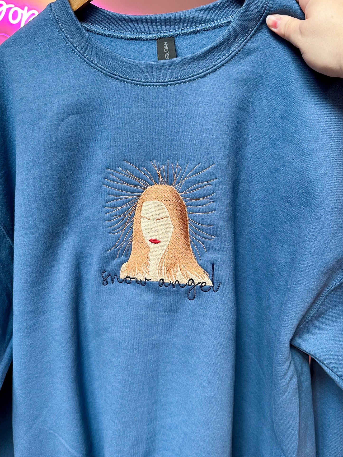 Snow Angel Cover Embroidered Crewneck